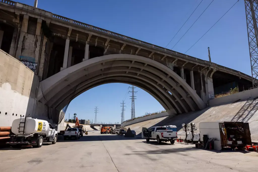 A bridge, at top, frames the L.A. River’s concrete channel. (Jay L. Clendenin / Los Angeles Times)